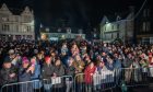 Crowds gathered in the town square in Aberfeldy for Hogmanay.