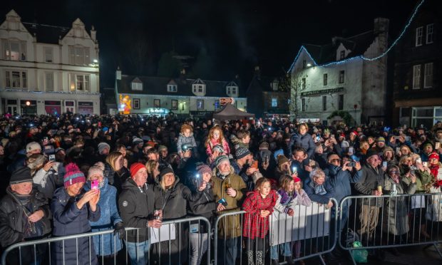 Crowds gathered in the town square in Aberfeldy for Hogmanay.