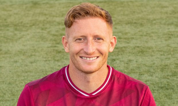 Jason Thomson in Kelty Hearts kit.