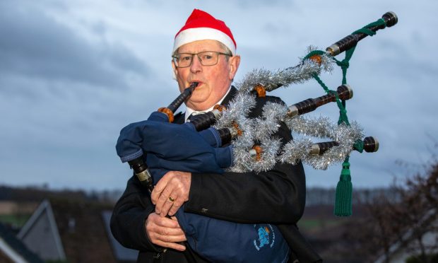Cupar Pipe Band member Douglas Provan. Image: Kenny Smith/DC Thomson