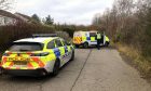 Police at Clatto Country Park in Dundee. Image: James Simpson/DC Thomson