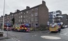Three fire appliances were called to the Dens Road flat. Image: James Simpson/DC Thomson