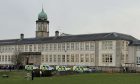 Police vans at Perth Academy after a fire was reported