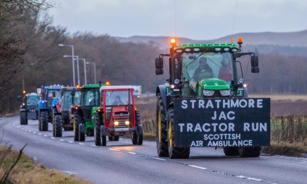 Strathmore JAC host a Hogmanay Tractor Run in aid of Scotland's Charity Air Ambulance. Image: Steve MacDougall/DC Thomson