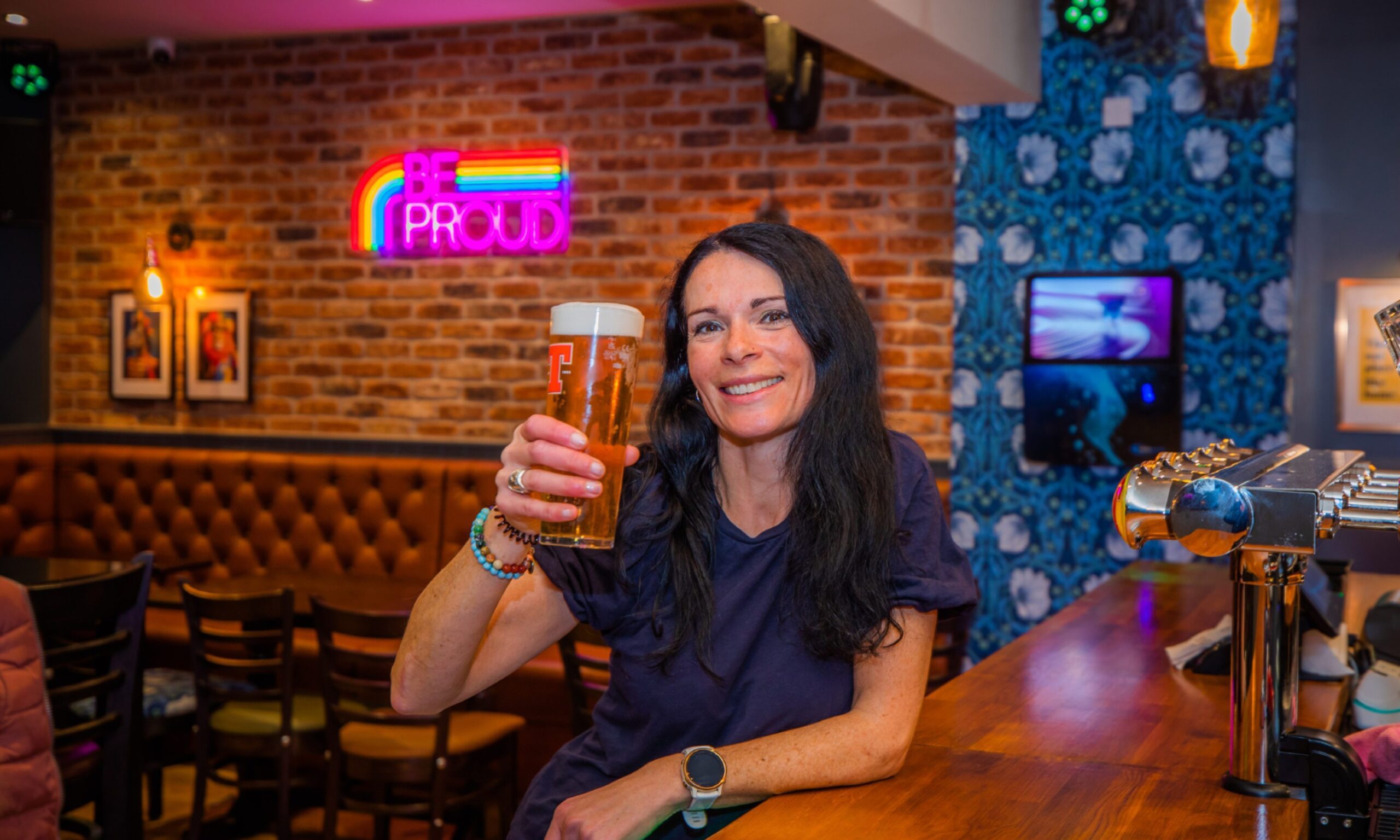 Gayle has a pint at The Rainbow Rooms (part of The Venue) in Perth. Image: Steve MacDougall/DC Thomson.