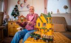 Ally Annand with some of his lolly stick creations. Image: Steve MacDougall/DC Thomson