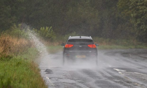 Heavy rain has caused flooding on several roads. Image: Steve MacDougall/DC Thomson