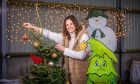 Wonky but wonderful - Kate Spurway with one of Feddal Christmas Trees' 'imperfect' specimens. Image: Steve MacDougall/DC Thomson