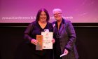 Sarah Thomson, left, receiving her Businesswoman of the Year award from Joyce White OBE Image: Supplied.