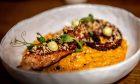Grilled octopus tentacle with paprika riso potato.