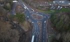 Drone pictures show the new three-lane system approaching the Swallow Roundabout near Dundee.