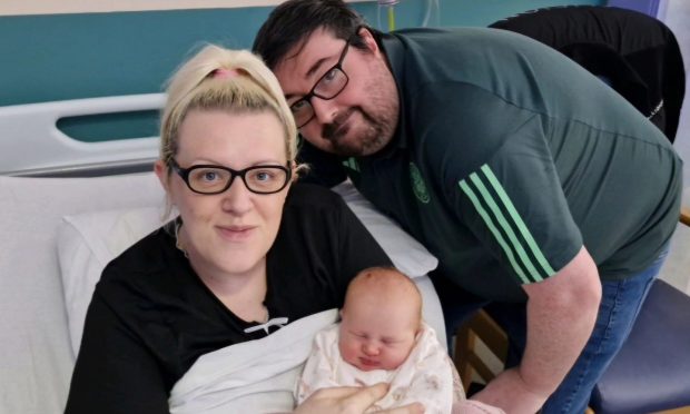 Sara Wood and Daniel Stuart with baby Maya. Image: NHS Tayside