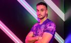 Vicko Sevelj shows off Dundee United's new third kit that they will sport against Motherwell