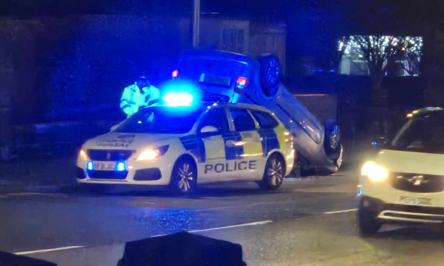 Car overturned on Halbeath Road in Dunfermline.