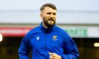 St Johnstone defender Kyle Cameron warming up in Aberdeen.