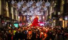 The Dundee Hooley parade, including a giant light up lobster, makes its way along Reform Street. Image: Mhairi Edwards/DC Thomson