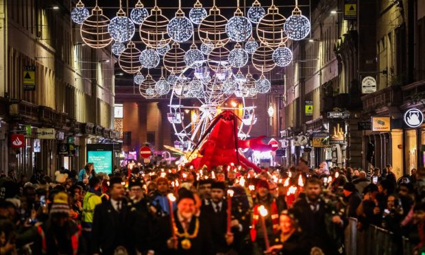 The Dundee Hooley parade, including a giant light up lobster, makes its way along Reform Street. Image: Mhairi Edwards/DC Thomson