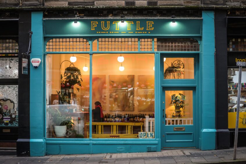 The exterior of Futtle on Dundee's Commercial Street is an eye-catching greeny blue colour.