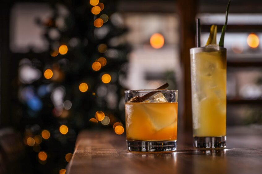 Two Bruach cocktails - Smoke and Spice, and Pear of the Dog sit on the bar at the Broughty Ferry pub