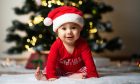 Baby's first Christmas is a magical milestone. Image: Shutterstock.