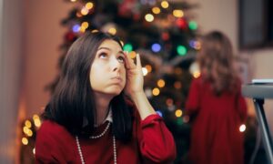 Woman worrying about Christmas presents.