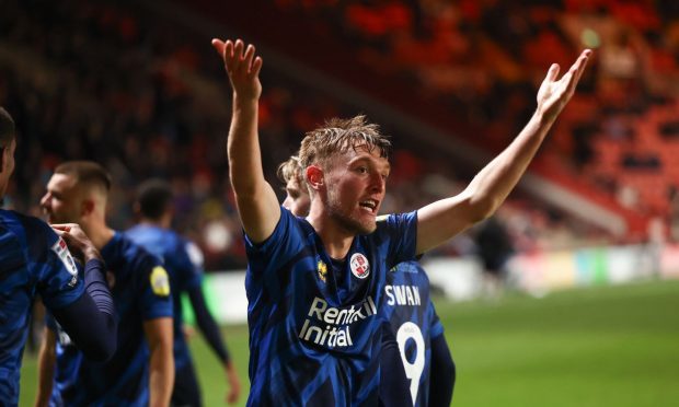 Max Anderson celebrates his winner for Crawley Town at Charlton.