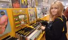 Cally Gouldthorpe, 18, from Monifieth, browses vinyl at Thirteen Records, Union Street, Dundee. Image: Michael Alexander