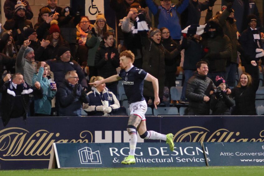 Simon Murray enjoyed the moment after giving Dundee the lead. Image: Ross Johnston/Shutterstock