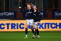 Dundee's goal-scorer Simon Murray celebrates with provider Fin Robertson. Image: David Young/Shutterstock