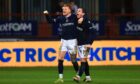 Dundee's goal-scorer Simon Murray celebrates with provider Fin Robertson. Image: David Young/Shutterstock