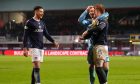 Dundee players enjoy the final whistle celebrations after beating Dundee United. Image: Mark Runnacles/Shutterstock