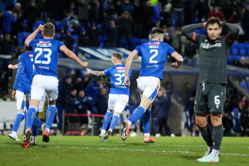 St Johnstone players after Bozo Mikulic's winner.