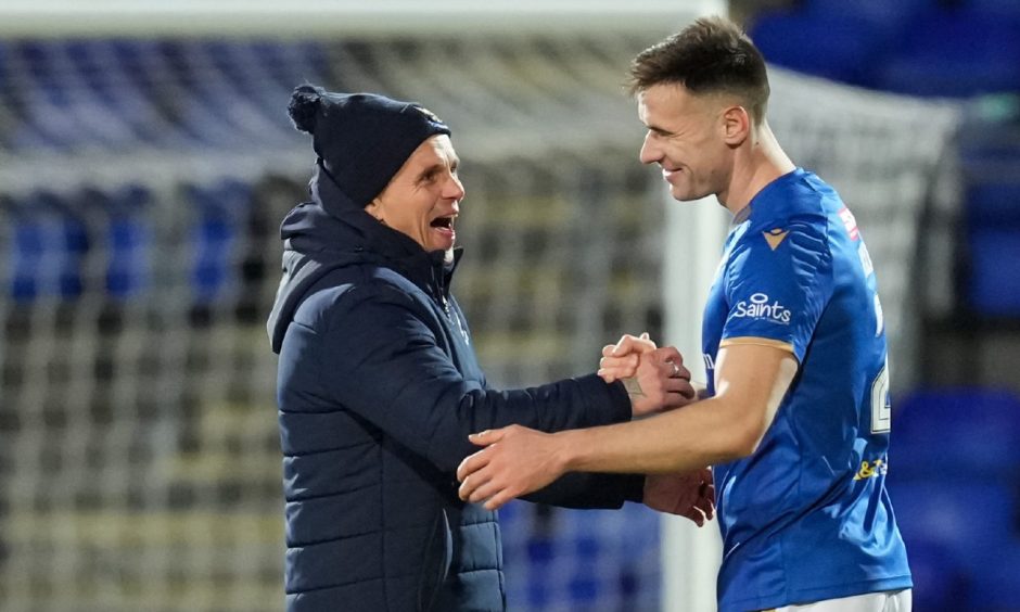 Simo Valakari with Bozo Mikulic at full-time after St Johnstone beat Motherwell.