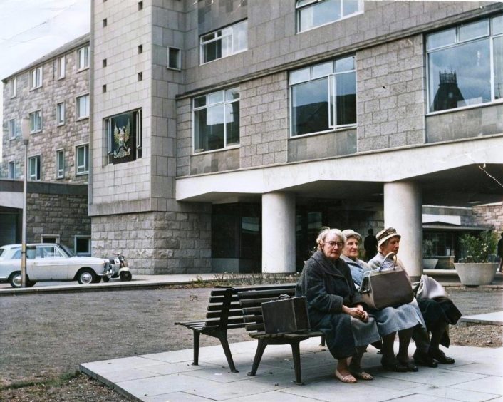 Shoppers enjoy a seat on one of the benches in St John's Square in May 1963.