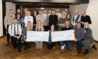 Figures from the two groups receive their £125k grants at the Montrose Playhouse presentation. Image: Paul Reid