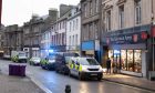 Emergency vehicles on the High Street in Arbroath on Wednesday afternoon. Image: Paul Reid