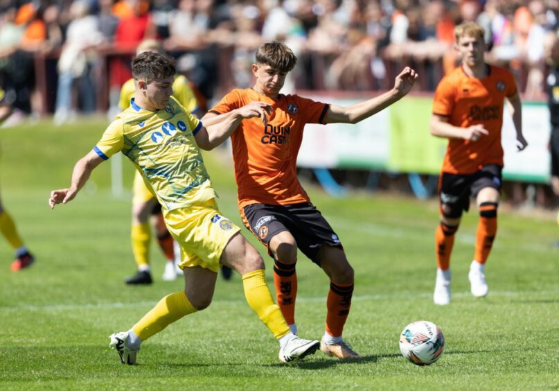 Dundee United's Alan Domeracki challenges Brechin's Spencer Moreland