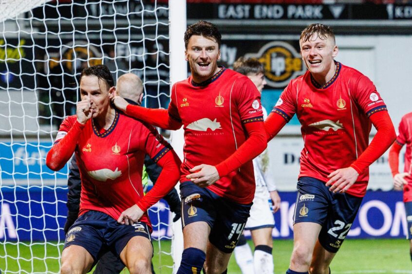 Luke Graham (right) celebrates with Falkirk at Dunfermline. Image: Ross Parker/SNS