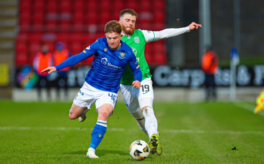 Fran Franczak battles with Hibernian's Nicky Cadden.