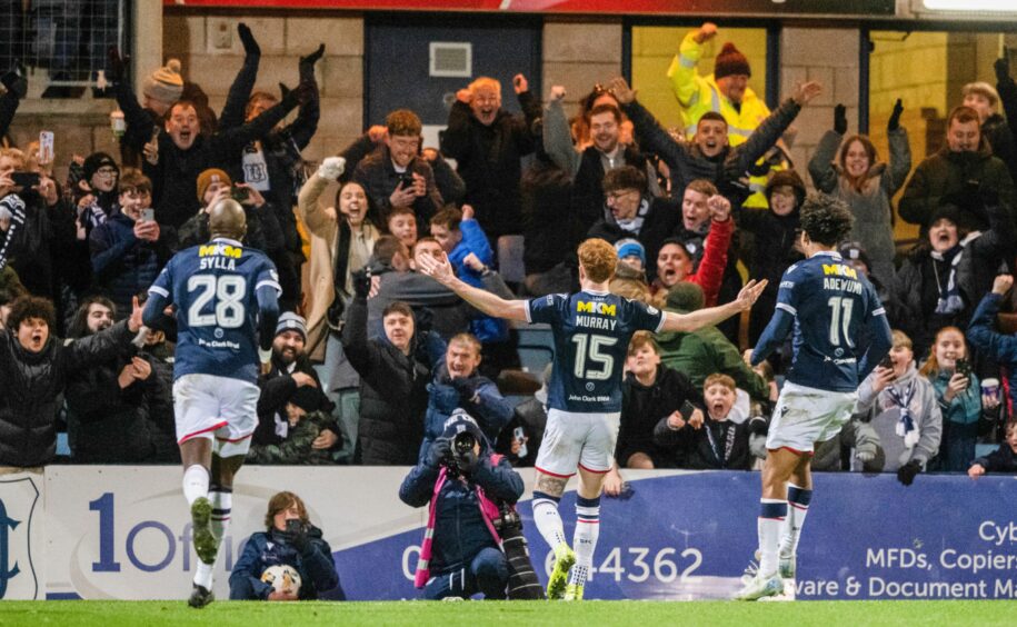 Simon Murray celebrates his derby goal in front of Dundee fans