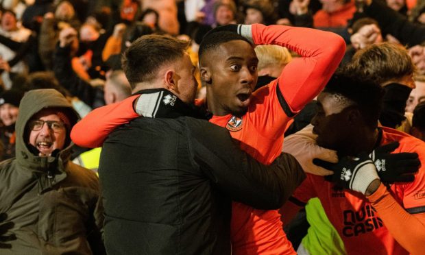 Emmanuel Adegboyega among adoring Arabs during Dundee United's win over Dundee