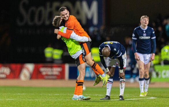 United enjoy their away day derby win at full-time. Image: Ewan Bootman/SNS