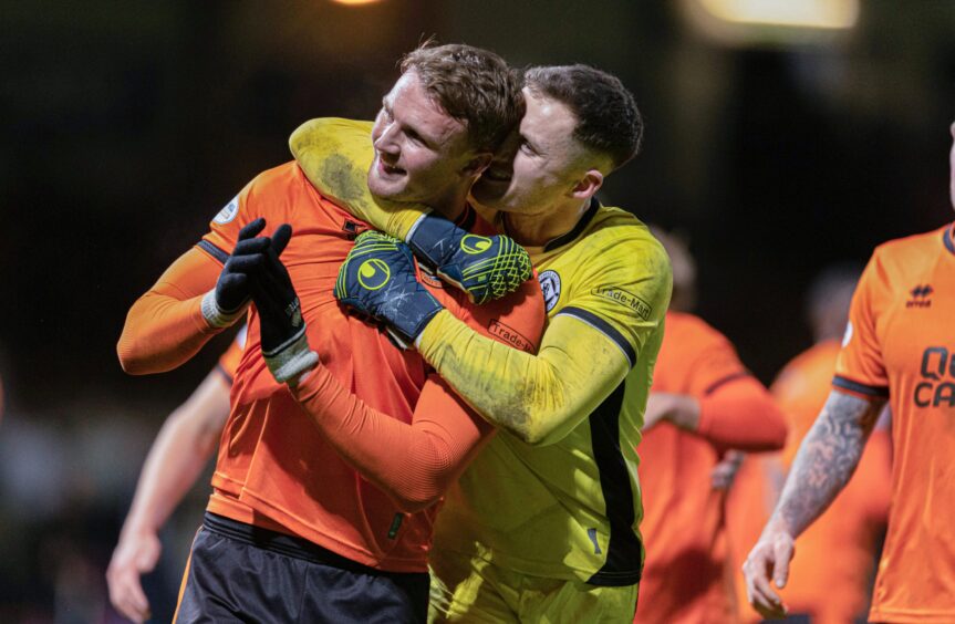 Dundee United Sam Dalby takes the acclaim of keeper Jack Walton