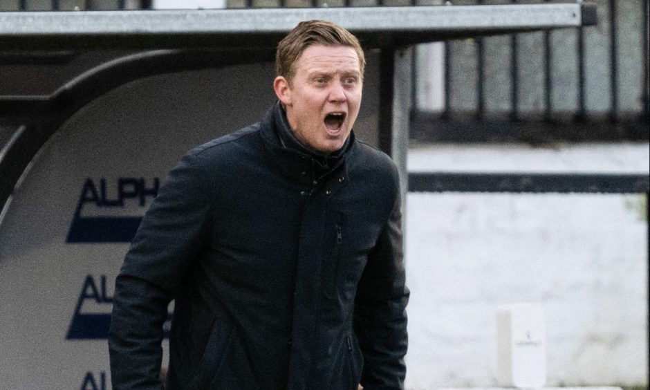 New Raith Rovers boss Barry Robson shouts instructions from the dugout.