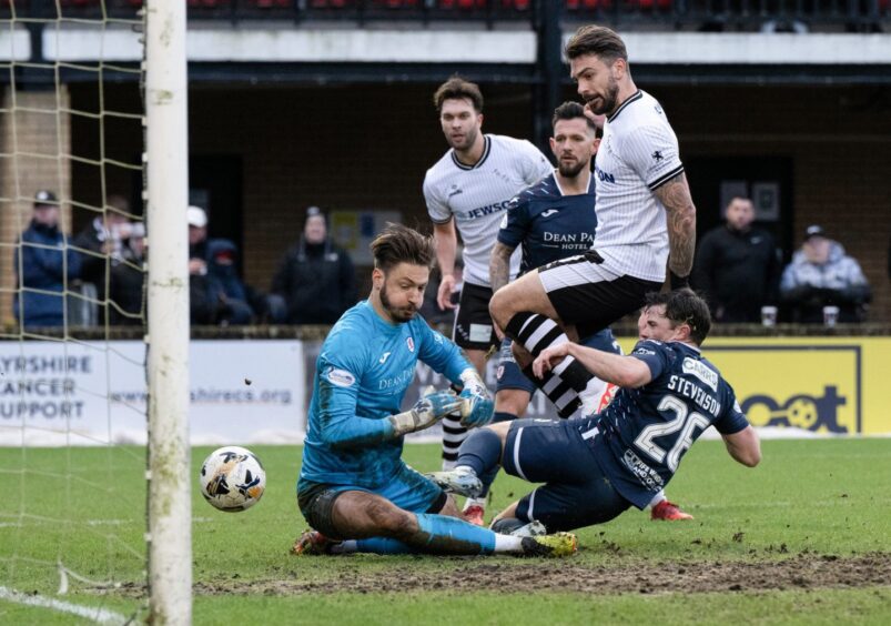 George Oakley pounces to complete his hat-trick against Raith Rovers.