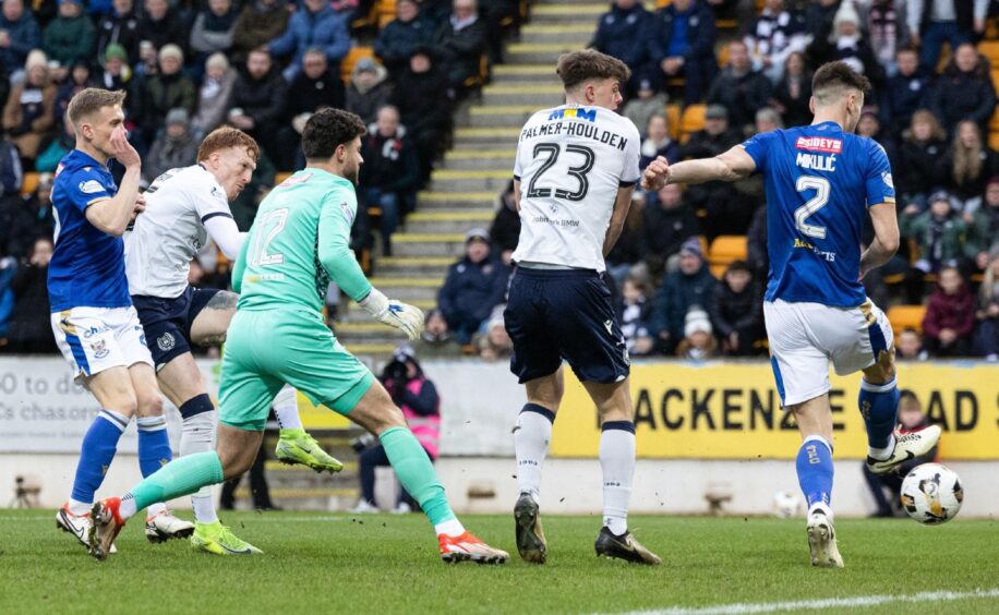 Dundee's Simon Murray scores to make it 1-0 against St Johnstone. 