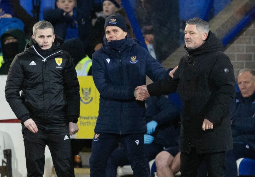 Simo Valakari shakes hands with Tony Docherty after St Johnstone's defeat to Dundee.