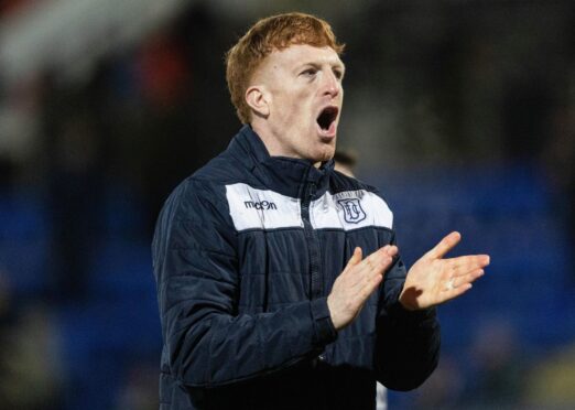 Simon Murray, pictured at full-time against St Johnstone, played a key role in Dundee's win in Perth. Image: Mark Scates/SNS