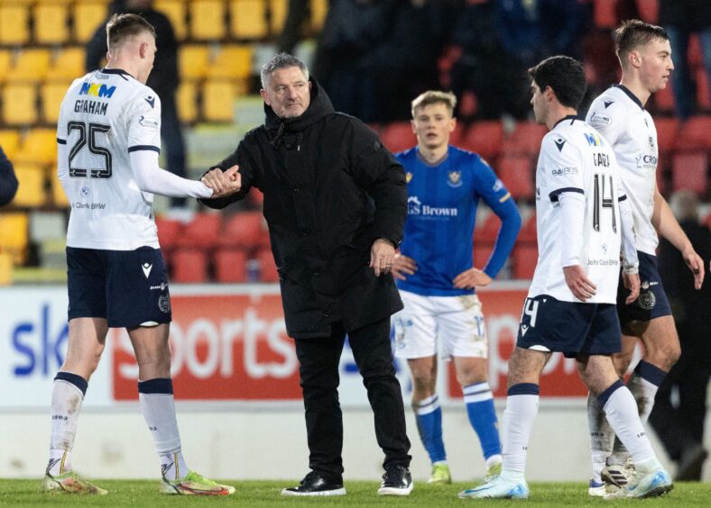 Luke Graham congratulated by Dundee boss Tony Docherty after defeating St Johnstone. Image: Mark Scates/SNS