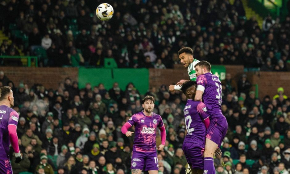 Celtic's Auston Trusty rattles the bar with a header.